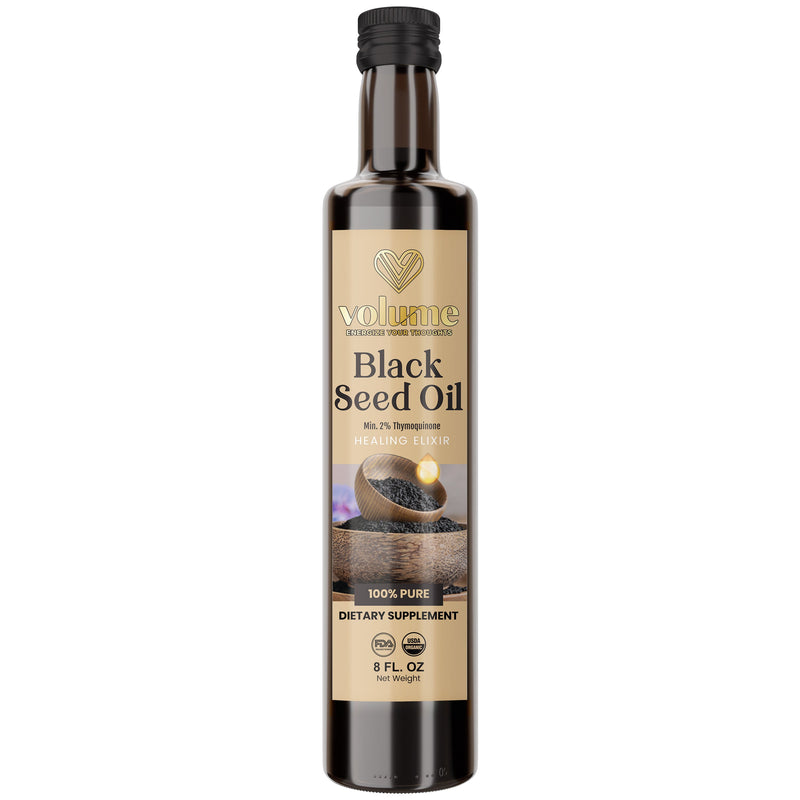 Volume High TQ black seed oil with scattered seeds